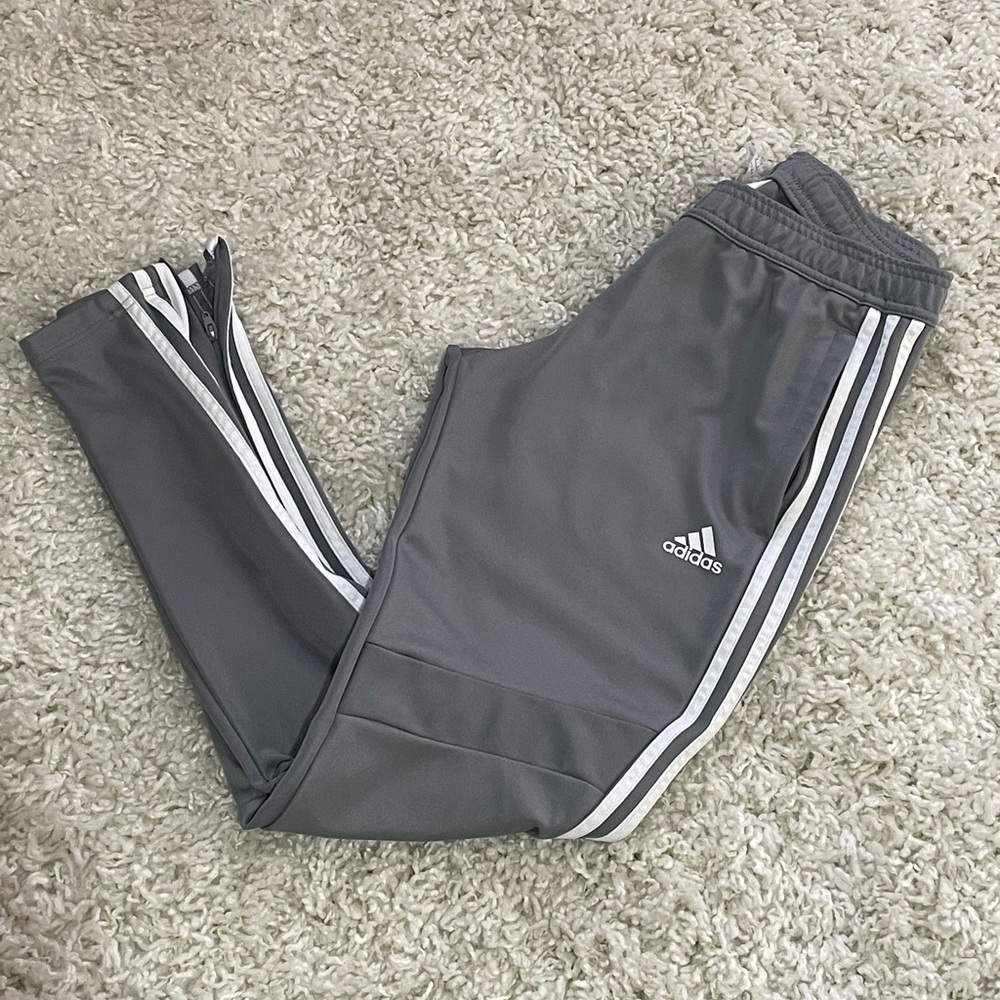 Adidas Tiro Pants in Grey with White Stripes in Women’s Small.